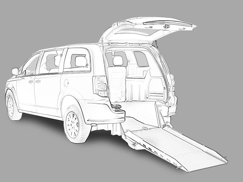 Silver Dodge Grand Caravan with Rear Entry Manual Fold Out ramp